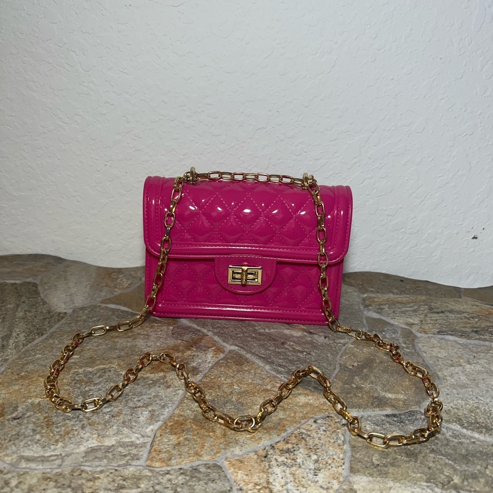 Purse Fuchsia hard plastic Metal Chain Gold Color Used. 21” Chain Length